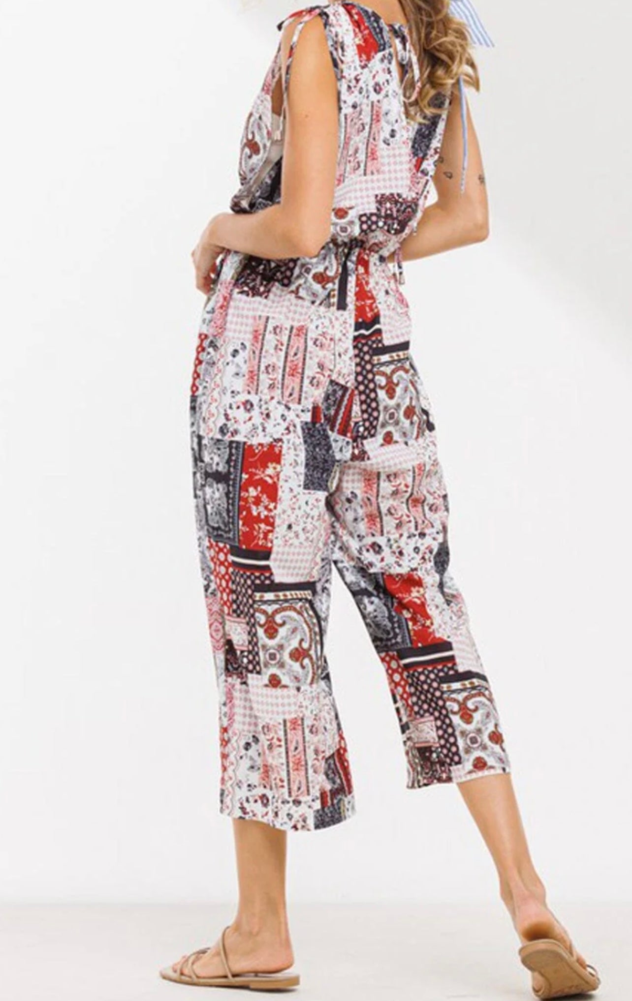 060825 - Vanessa Sleeveless Surplice Jumpsuit